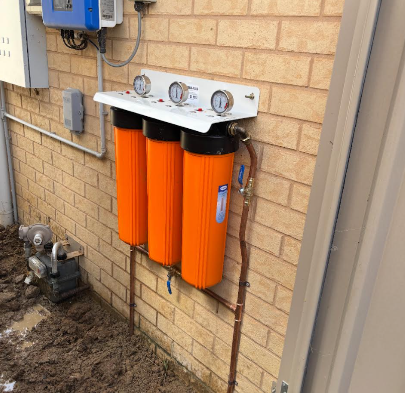 Whole-house water filtration